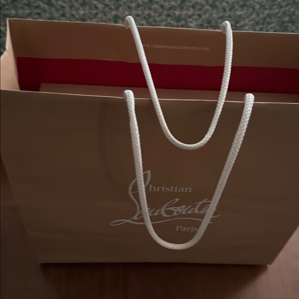 Christian Louboutin Tan Bag with White Handles used one time
